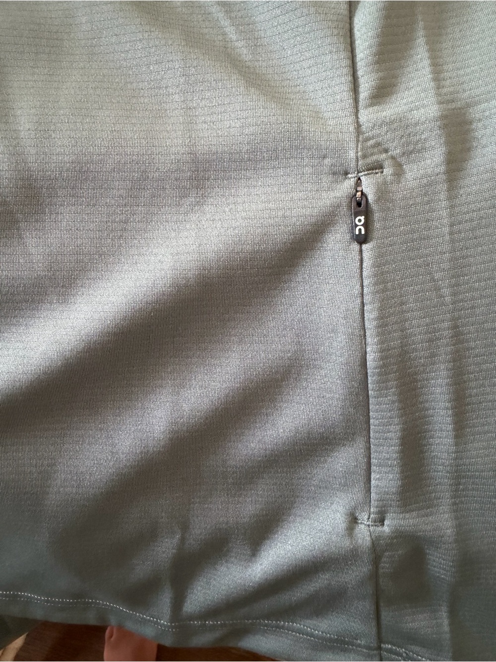 On Running Lightweight Long-Sleeve Half-Zip Top in Sage Green- climate shirt - Picture 4 of 5